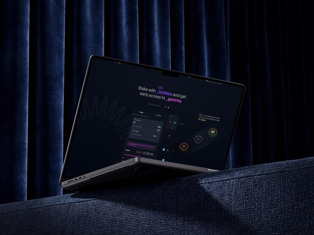 Gamma’s Lockbox interface on a laptop against blue curtains and upholstery